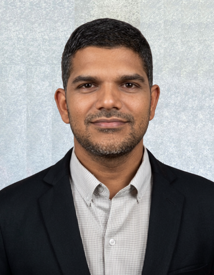 hispanic-businessman-with-arms-crossed-looking